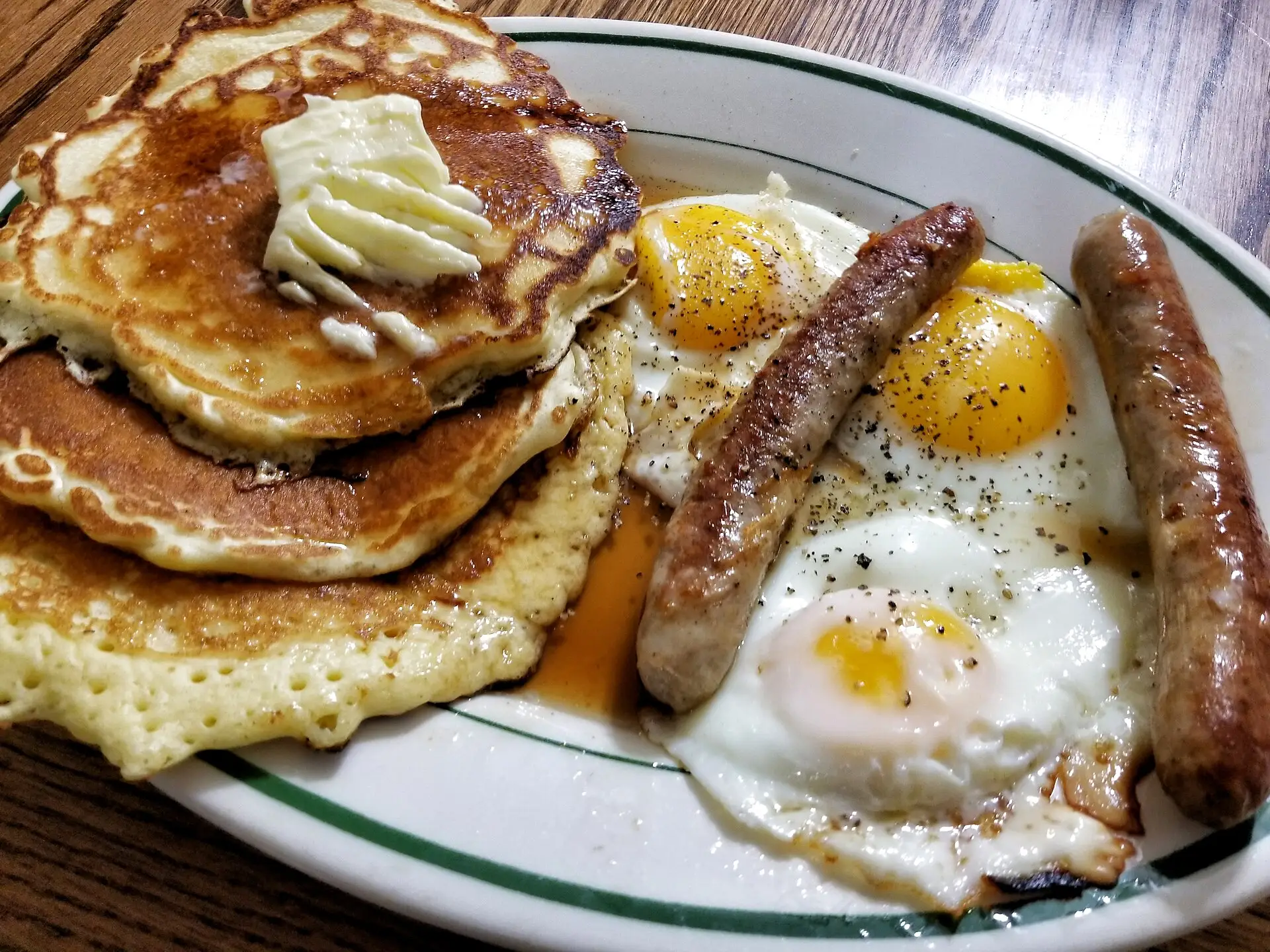 Pancakes with sausage and eggs. The photo was not taken at any restaurant on this list.