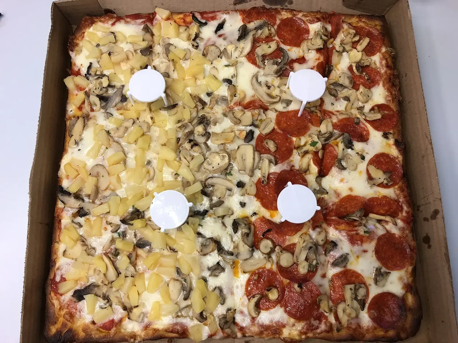 A Sicilian pizza with mushrooms, pineapple and pepperoni at a pizzeria in Dulles, Va., not one of the places on this list.