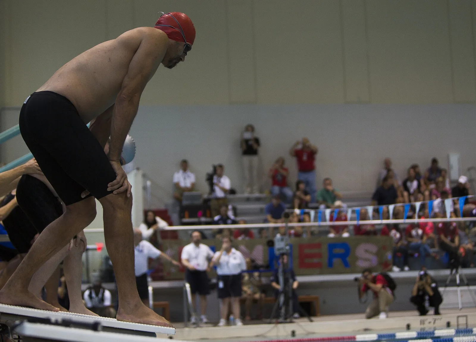 A swimmer on the starting block at the Freedom Aquatic and Fitness Center in Manassas.