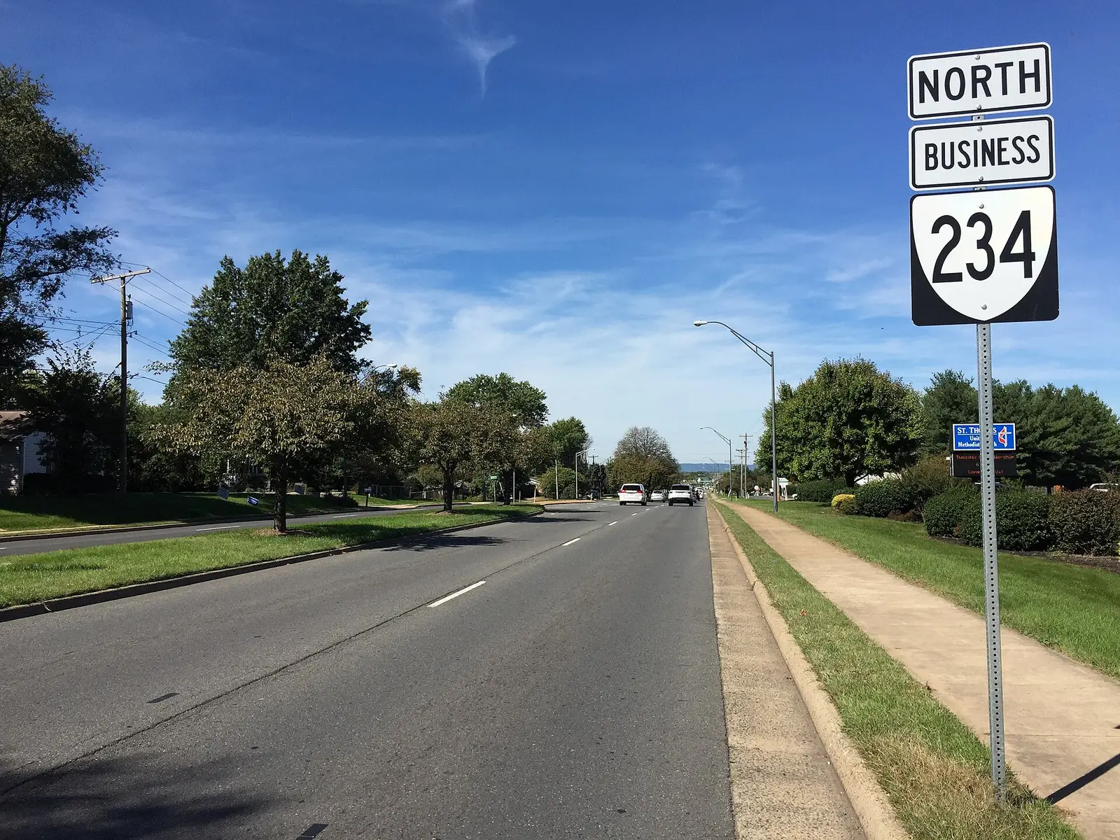 Sudley Road (Route 234 Business) at Grant Avenue, looking north along the edge of Landmark Square in Manassas.