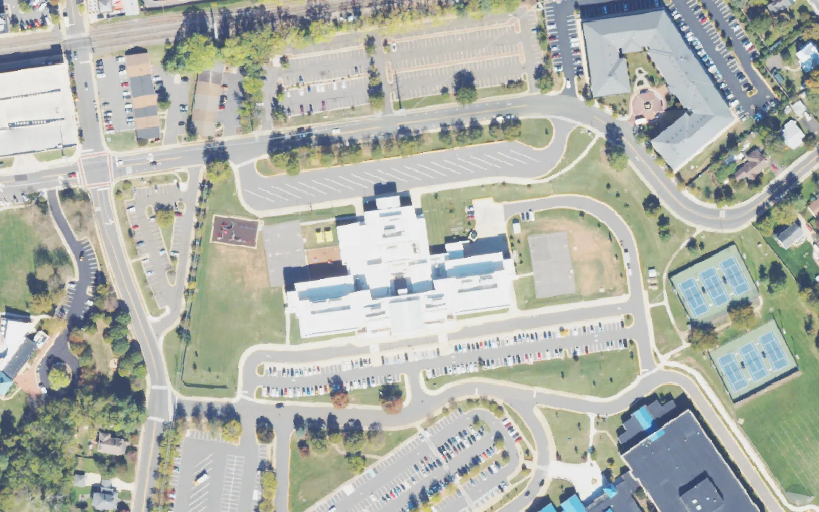 The Baldwin school building, shared by Baldwin Elementary and Baldwin Intermediate, from the air with its playground and courts off Eagle Way in Manassas.