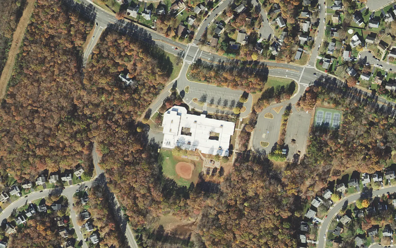 George Carr Round Elementary School from the air, beside the woods along Hastings Drive in southwest Manassas.