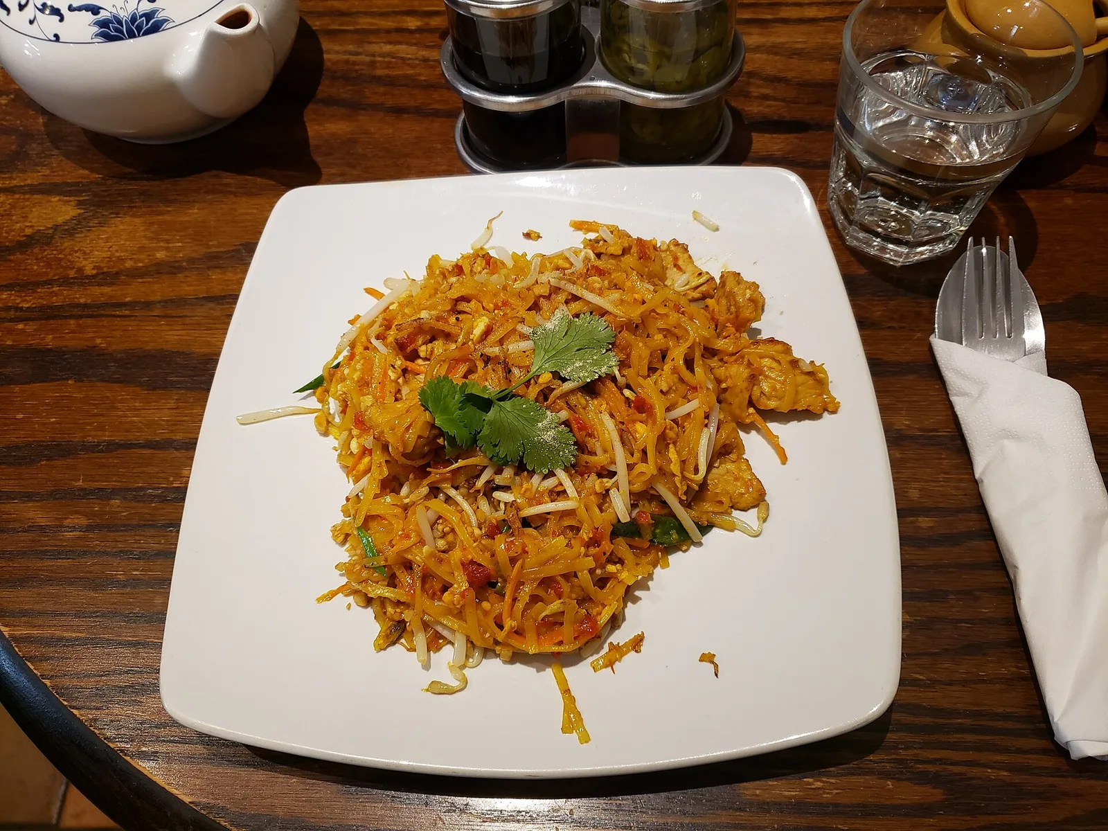 A plate of pad thai with pork. The photo was not taken at any restaurant on this list.